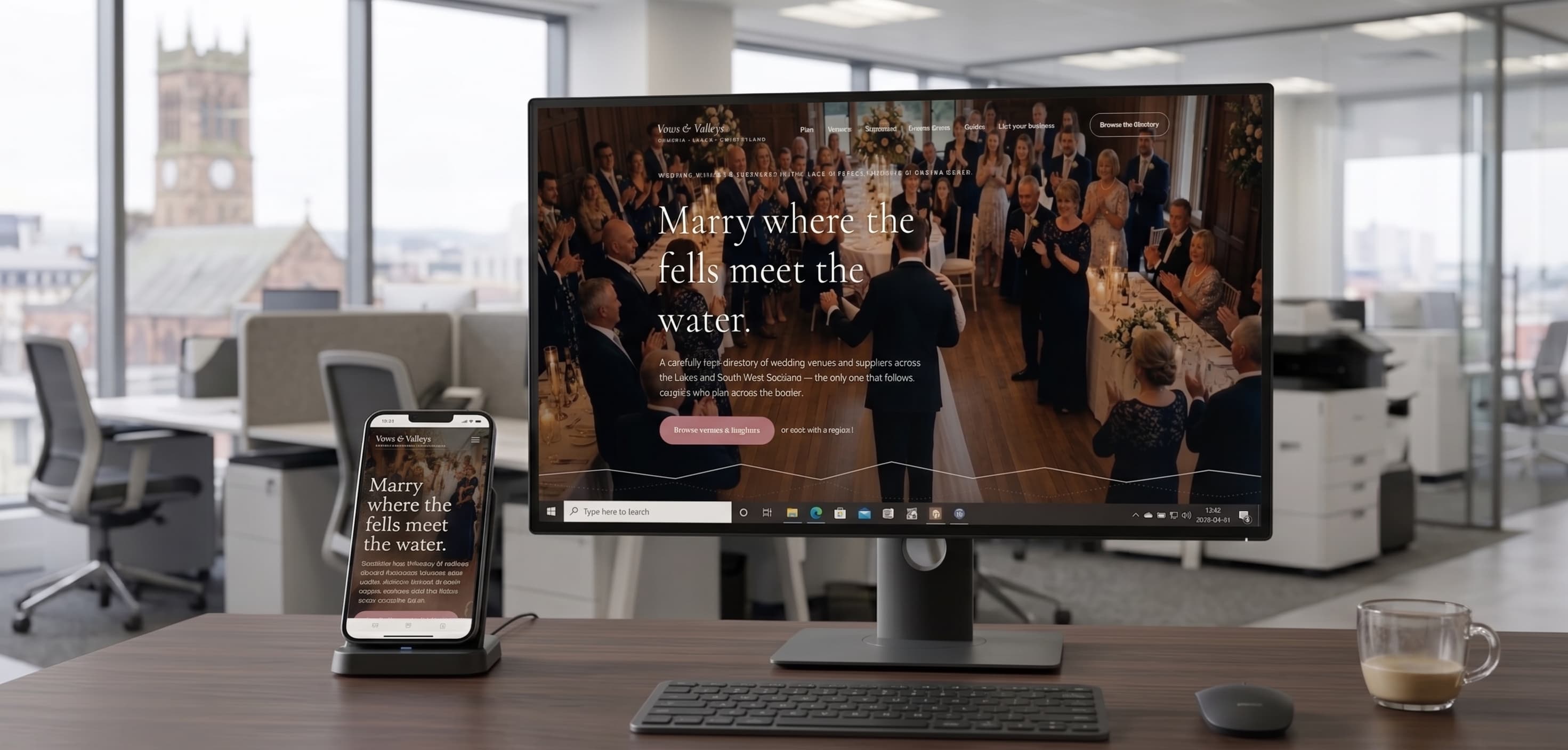 Vows & Valleys wedding directory shown on a desktop monitor and phone in a home office